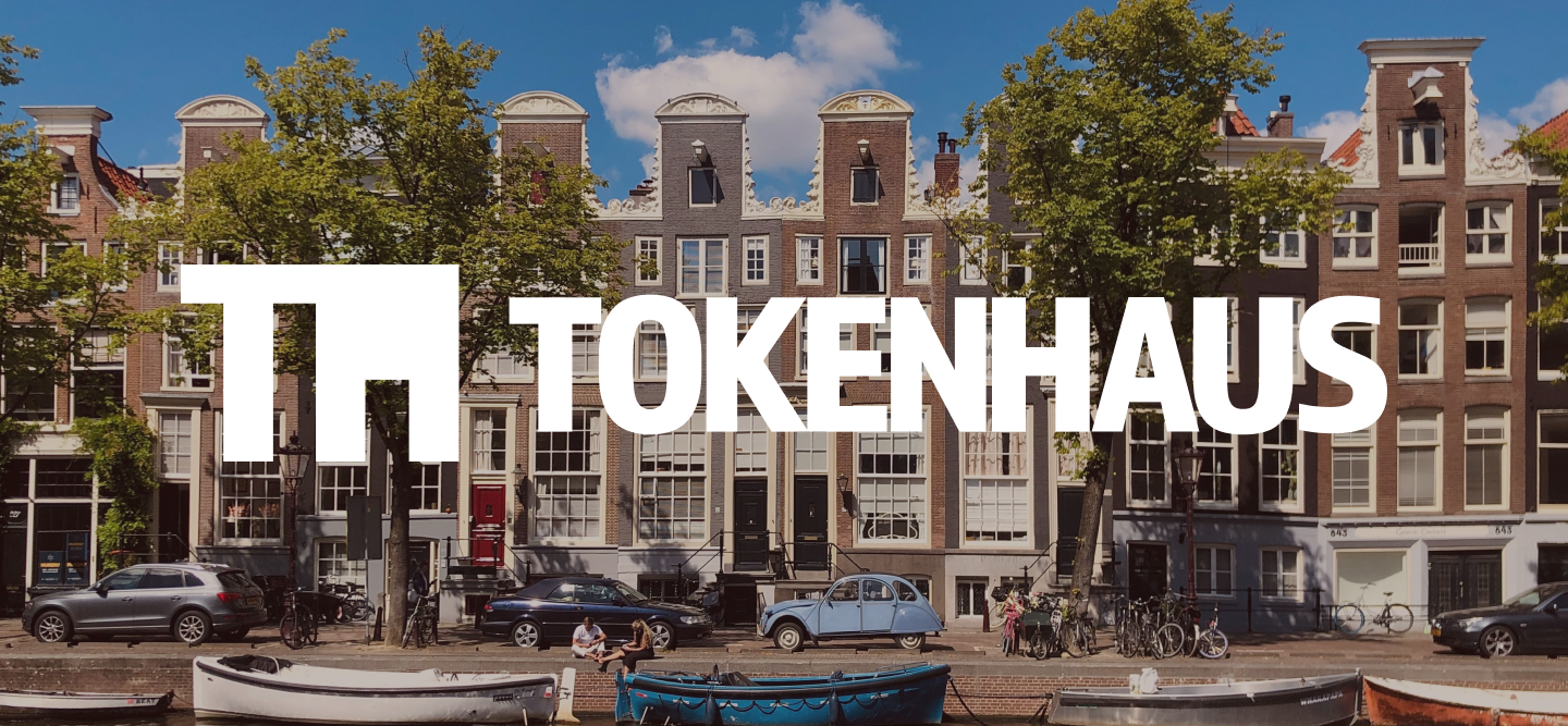 Amsterdam canal houses with the TokenHaus wordmark